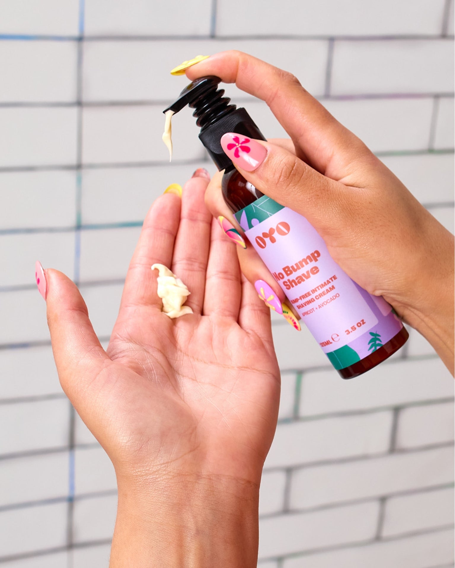 Hand holding No Bump Shave cream, perfect for irritation-free skin and effective skincare for all skin types.